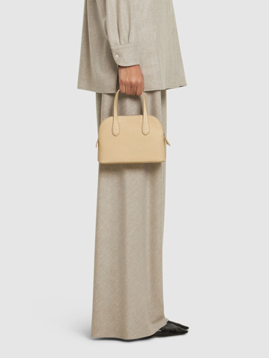 The Row: Ingrid saddle shiny leather bag - Tuscan - women_1 | Luisa Via Roma