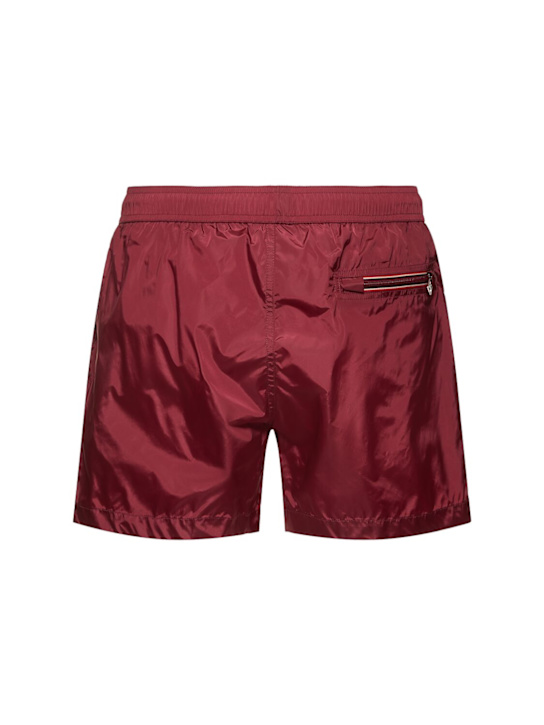 Moncler: Logo patch nylon swim shorts - Red - men_2 | Luisa Via Roma