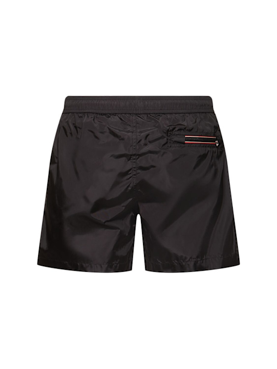 Moncler: Logo patch nylon swim shorts - Black - men_2 | Luisa Via Roma