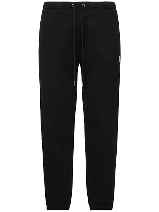 Moncler: Logo patch cotton track pants - men_0 | Luisa Via Roma