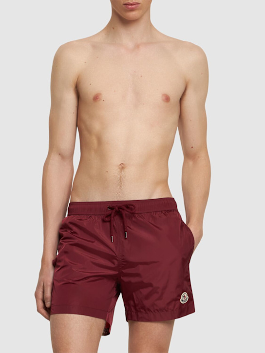 Moncler: Logo patch nylon swim shorts - Red - men_1 | Luisa Via Roma