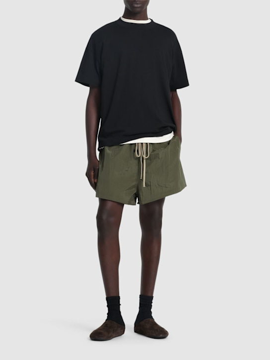 Fear of God ESSENTIALS: Ripstop running shorts - men_1 | Luisa Via Roma