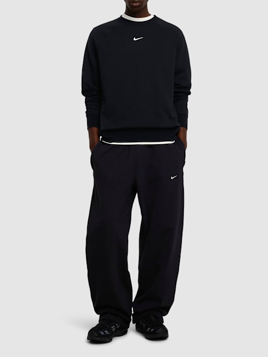 Nike: Fleecehose „Solo Swoosh“ - men_1 | Luisa Via Roma