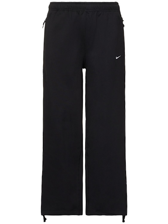 Nike: Fleecehose „Solo Swoosh“ - men_0 | Luisa Via Roma