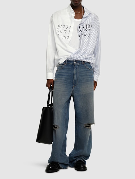 MM6 Maison Margiela: 5-pocket distressed denim jeans - men_1 | Luisa Via Roma