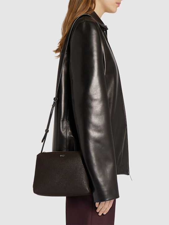 Khaite: Medium Lina grain leather crossbody bag - Espresso - women_1 | Luisa Via Roma