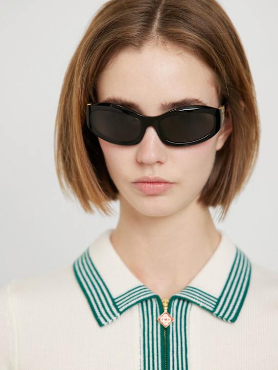 Miu Miu: Oval acetate sunglasses - Black/Grey - women_1 | Luisa Via Roma