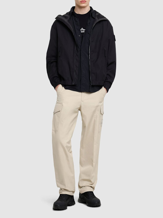 Stone Island: Hooded zip jacket - men_1 | Luisa Via Roma