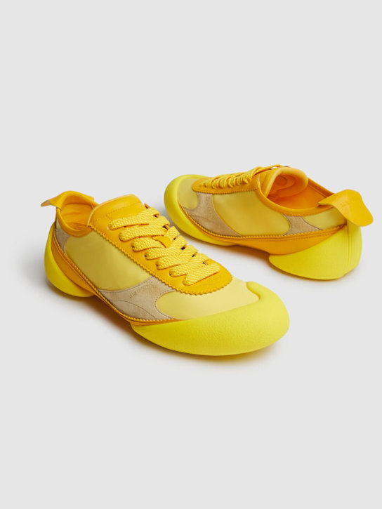 McQueen: Flexion leather sneakers - Yellow - men_1 | Luisa Via Roma
