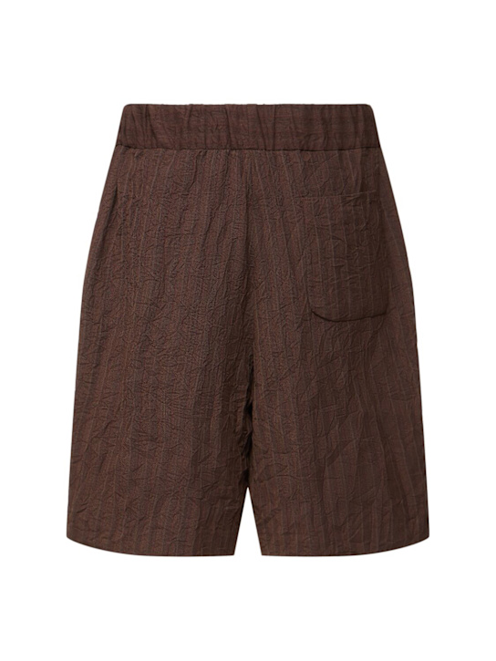 Dries Van Noten: Plato loose fit pleated shorts - Brown - men_3 | Luisa Via Roma