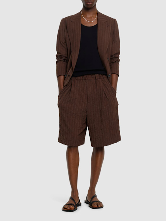 Dries Van Noten: Plato loose fit pleated shorts - Brown - men_1 | Luisa Via Roma