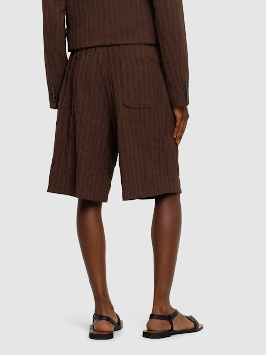 Dries Van Noten: Plato loose fit pleated shorts - Brown - men_2 | Luisa Via Roma