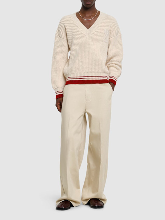 AMI Paris: Rib knit wool v-neck sweater - White Cream - men_1 | Luisa Via Roma