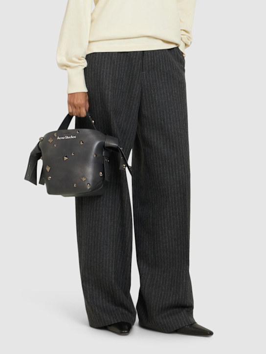 Acne Studios: Mini Musubi vintage studs top handle bag - Black - women_1 | Luisa Via Roma