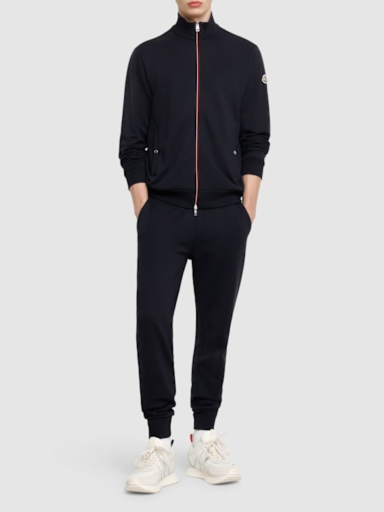 Moncler: Tricolour trimmed cotton trackpants - men_1 | Luisa Via Roma