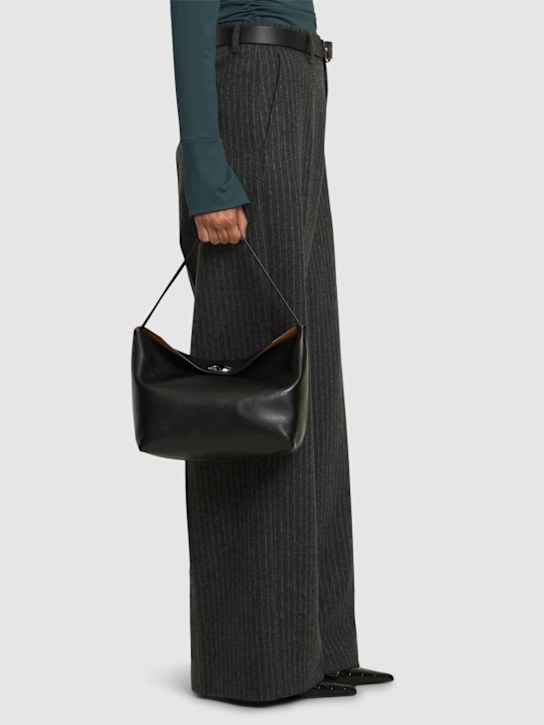 Christopher Esber: Turnlock leather shoulder bag - Black - women_1 | Luisa Via Roma