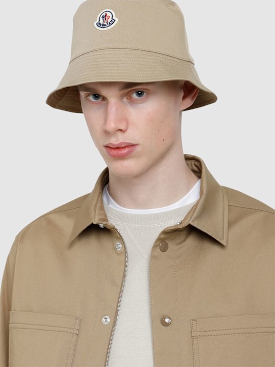Moncler: Logo reversible cotton blend bucket hat - Beige - men_1 | Luisa Via Roma
