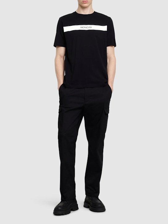 Moncler: Rubberised logo cotton t-shirt - Black - men_1 | Luisa Via Roma