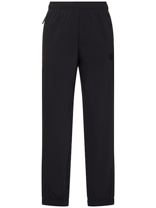 Moncler: Jogginghose aus Nylon mit Logopatch - Schwarz - men_0 | Luisa Via Roma