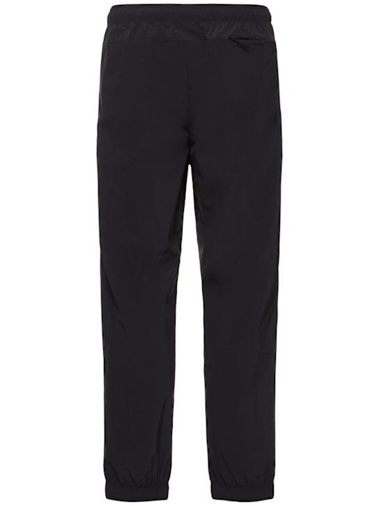 Moncler: Jogginghose aus Nylon mit Logopatch - Schwarz - men_3 | Luisa Via Roma