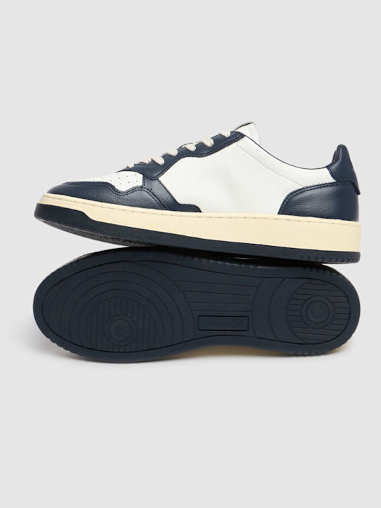 Autry: Medalist Bicolor Low sneakers - White/Blue - men_4 | Luisa Via Roma