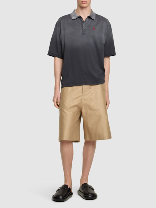 McQueen: Oversized cotton polo shirt - Black - men_1 | Luisa Via Roma