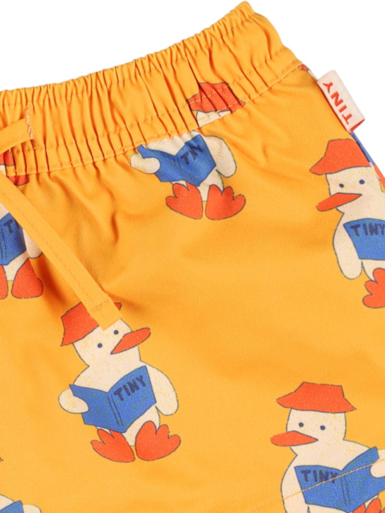 Tiny Cottons: Printed Lycra swim shorts - Yellow - kids-boys_1 | Luisa Via Roma