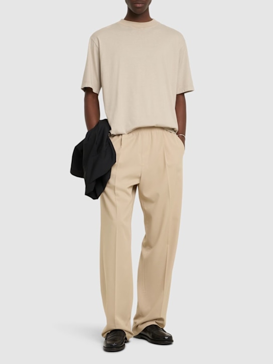 CELLAR DOOR: Ezio fluid pants - Beige - men_1 | Luisa Via Roma