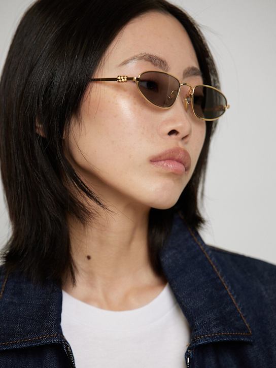 Miu Miu: Regard oval metal sunglasses - Gold/Grey - women_1 | Luisa Via Roma