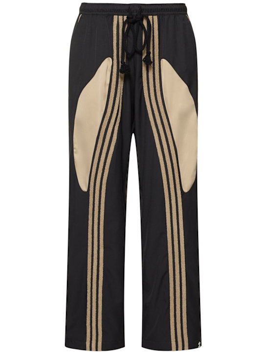 adidas Originals: Pantalones tejidos - Negro - men_0 | Luisa Via Roma
