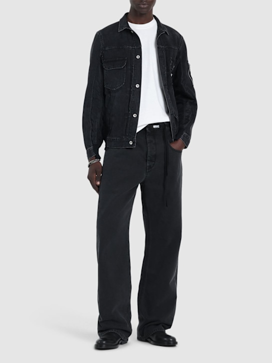 Ann Demeulemeester: Jeans Ronald in denim - men_1 | Luisa Via Roma