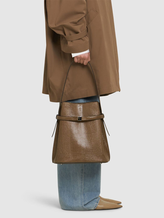 Toteme: Belted lizard-embossed bucket bag - Dark Olive - women_1 | Luisa Via Roma
