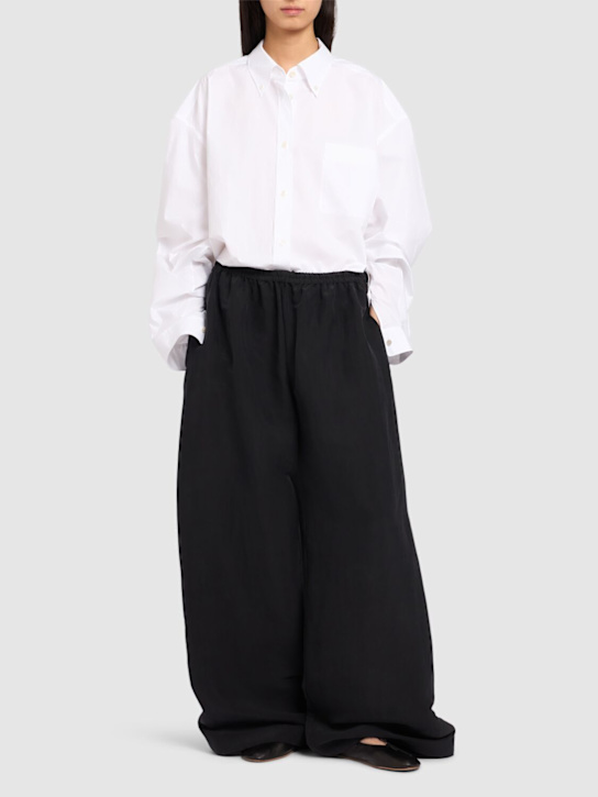 The Row: Bellana extra wide silk pants - Black - women_1 | Luisa Via Roma