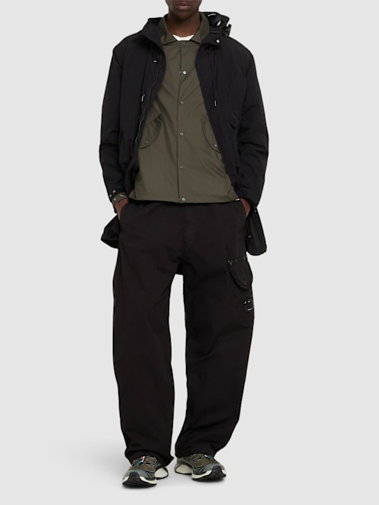 C.P. Company: Microreps boxy cargo lens pants - Black - men_1 | Luisa Via Roma