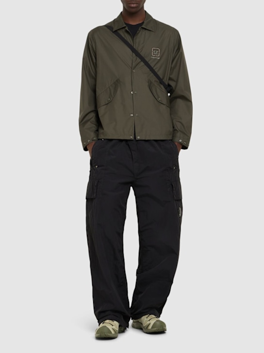 C.P. Company: Flatt nylon oversize pants - Black - men_1 | Luisa Via Roma