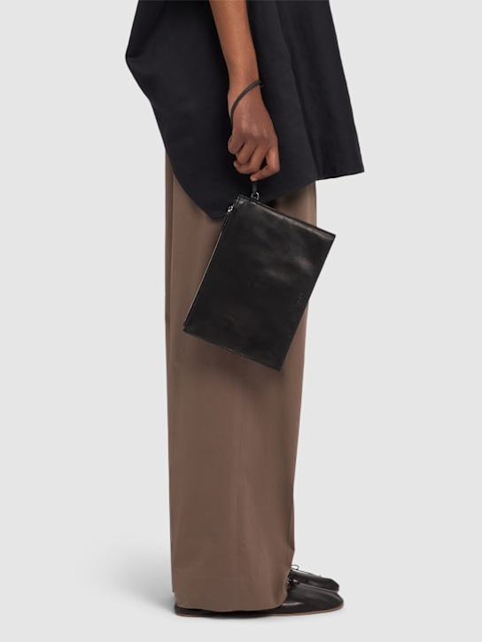 The Row: Wrislet leather pouch - Black - women_1 | Luisa Via Roma