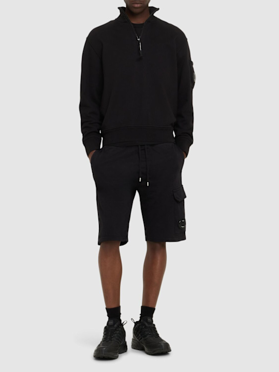 C.P. Company: Light fleece cargo lens shorts - Black - men_1 | Luisa Via Roma