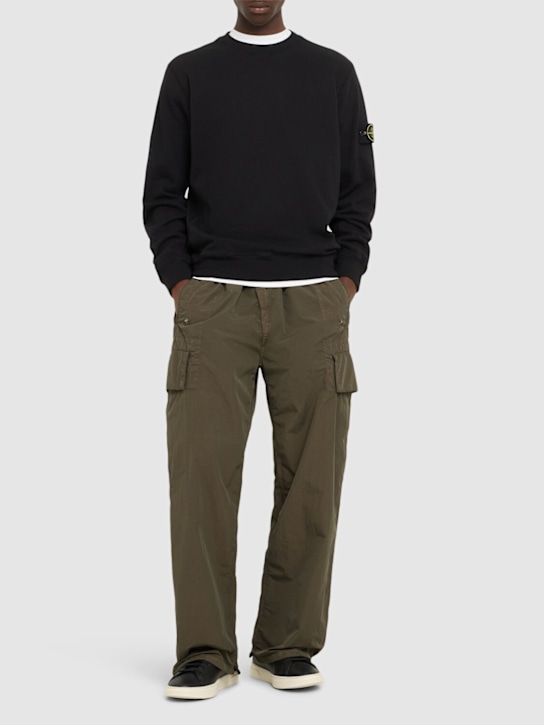Stone Island: Sudadera de algodón con cuello redondo - Negro - men_1 | Luisa Via Roma