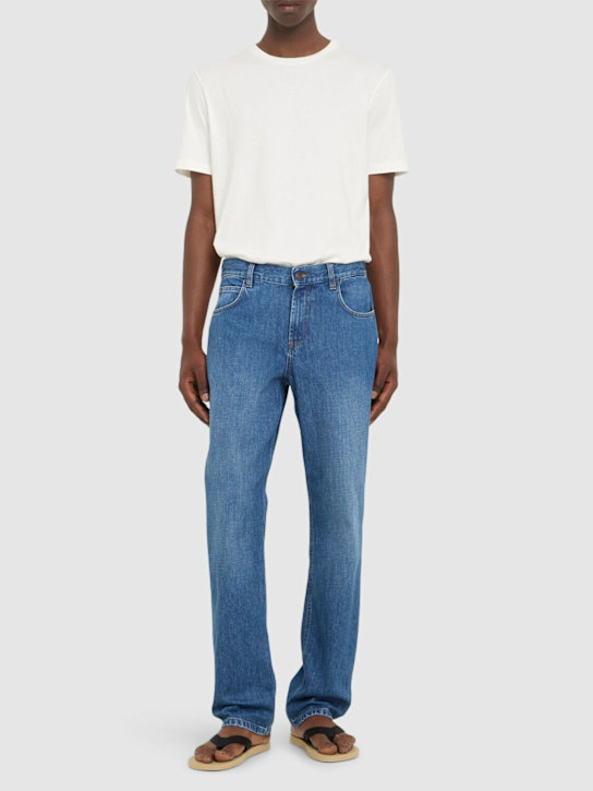 The Row: Jaxon cotton flared jeans - Washed Blue - men_1 | Luisa Via Roma