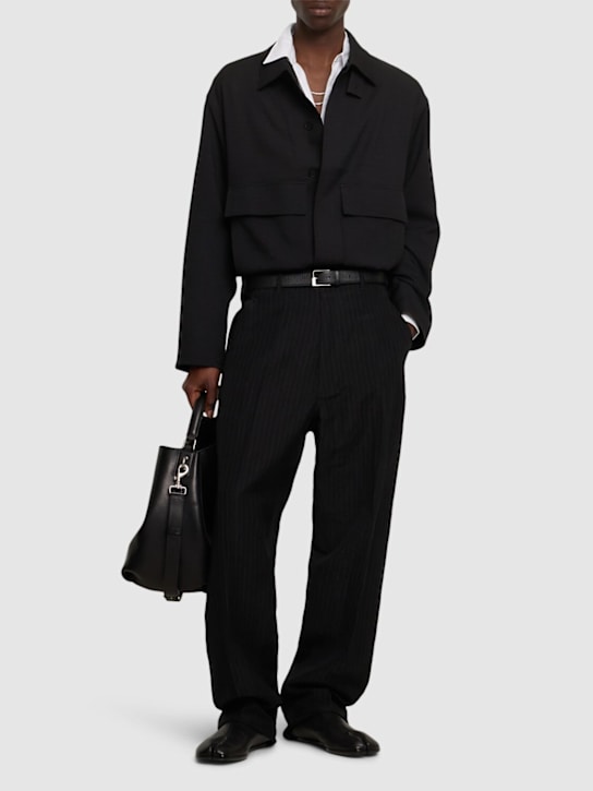Maison Margiela: Pinstripe wool & linen pants - men_1 | Luisa Via Roma