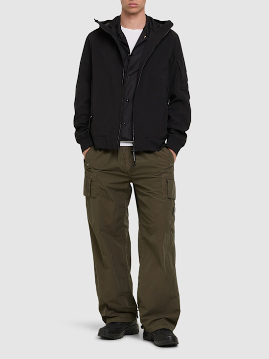 C.P. Company: C.P. Shell-R hooded jacket - Black - men_1 | Luisa Via Roma