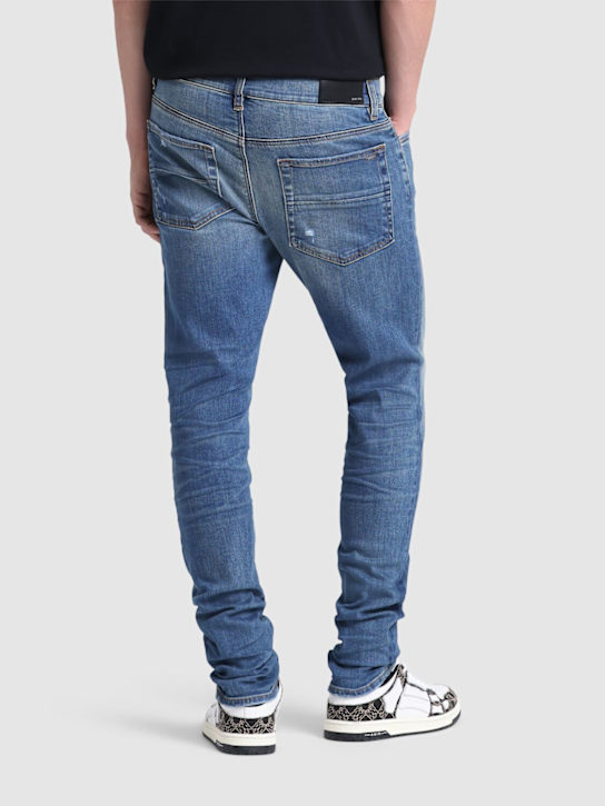 Amiri: 15cm Stack cotton denim jeans - Dark Indigo - men_2 | Luisa Via Roma