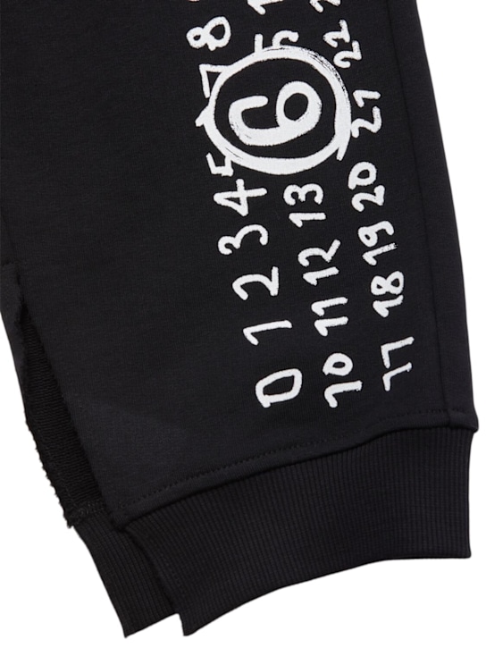 MM6 Maison Margiela: Printed cotton sweatpants - ブラック - kids-boys_1 | Luisa Via Roma