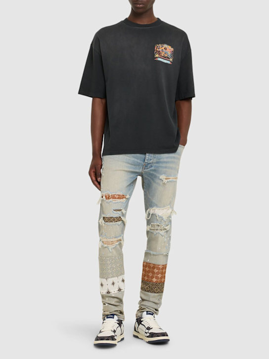 Amiri: MA Quad Artpatch紧身牛仔裤 - 浅蓝色 - men_1 | Luisa Via Roma