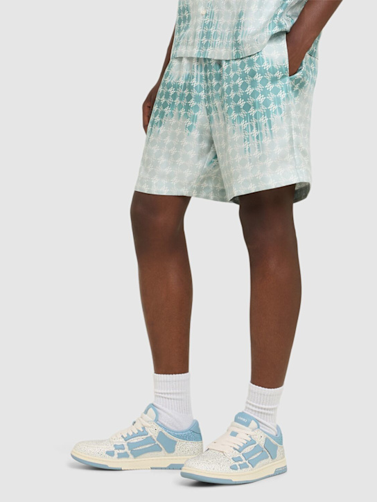 Amiri: Crystal Skel Top Low sneakers - Ocean Sky - men_1 | Luisa Via Roma