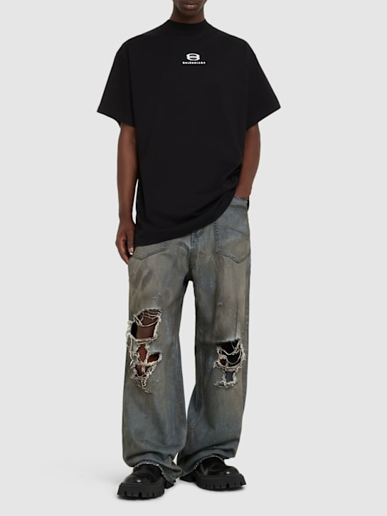 Balenciaga: Baggy-Jeans aus Baumwolle mit Rissen - Blau - men_1 | Luisa Via Roma