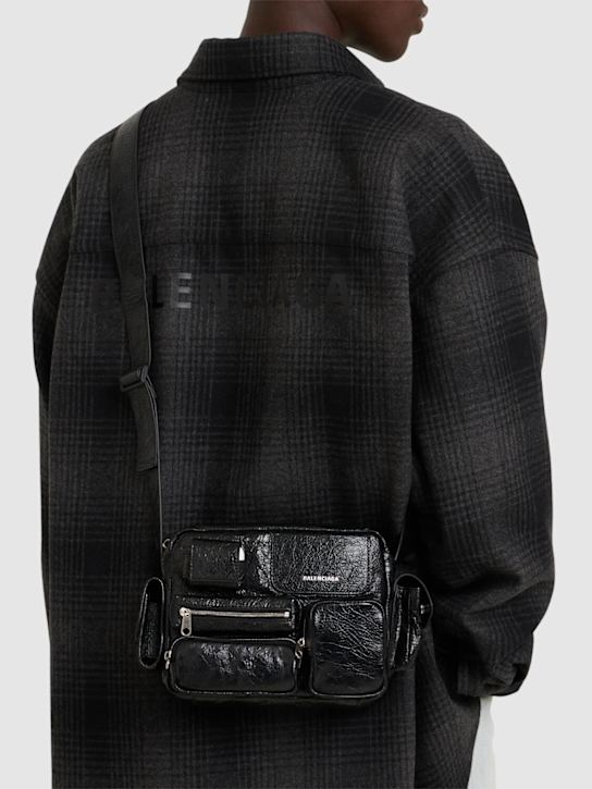 Balenciaga: Superbusy leather messenger bag - Black - men_1 | Luisa Via Roma