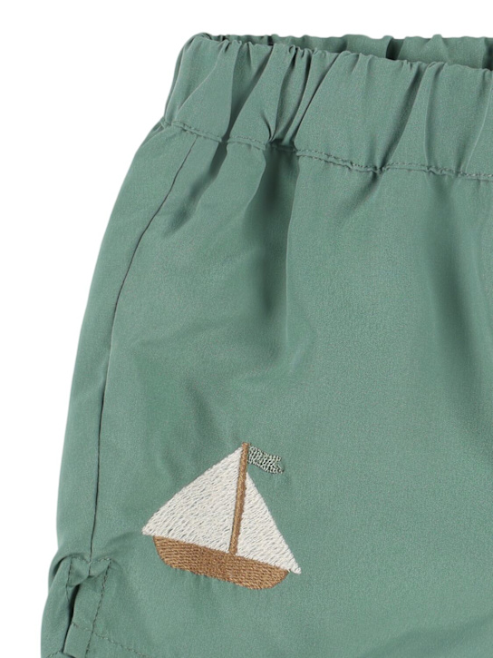Donsje: Boat print nylon swim shorts - Light Green - kids-boys_1 | Luisa Via Roma