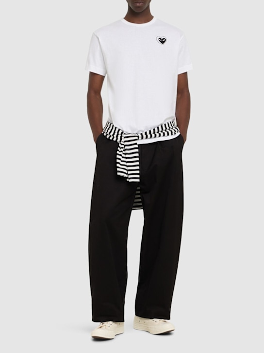 Comme des Garçons Play: Mini cotton logo t-shirt w/ studs - men_1 | Luisa Via Roma