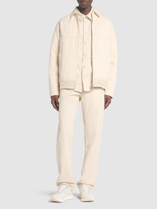 Moncler: Cotton denim straight jeans - Ivory - men_1 | Luisa Via Roma
